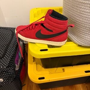 Red High-Top Sneakers with Black Swoosh